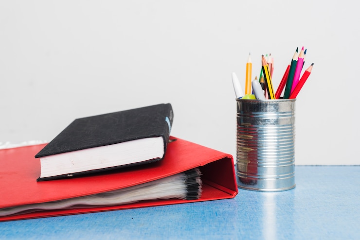 book-folder-near-stationery_23-2147846226